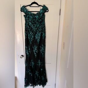 Black with teal/green sequins worn once.